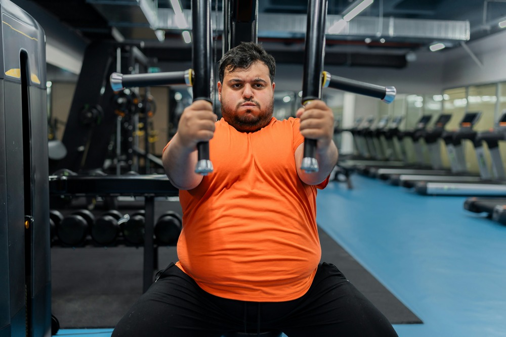 Man exercising after using fat burning fingerprint
