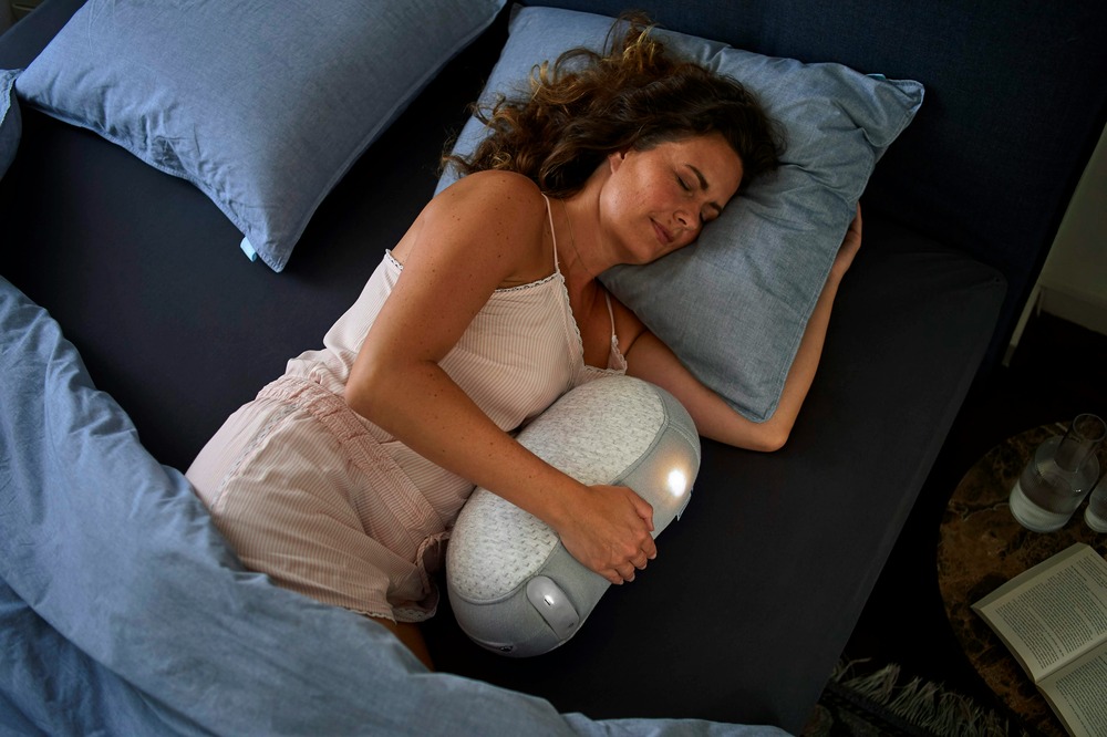 sleeping women peacfully after taking resurge